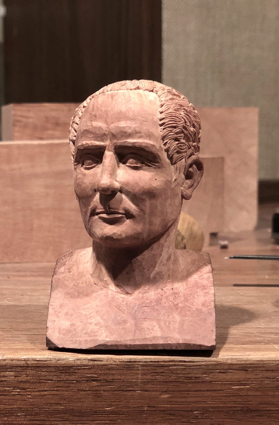 Hand-carved wooden bust by J Drake Customs