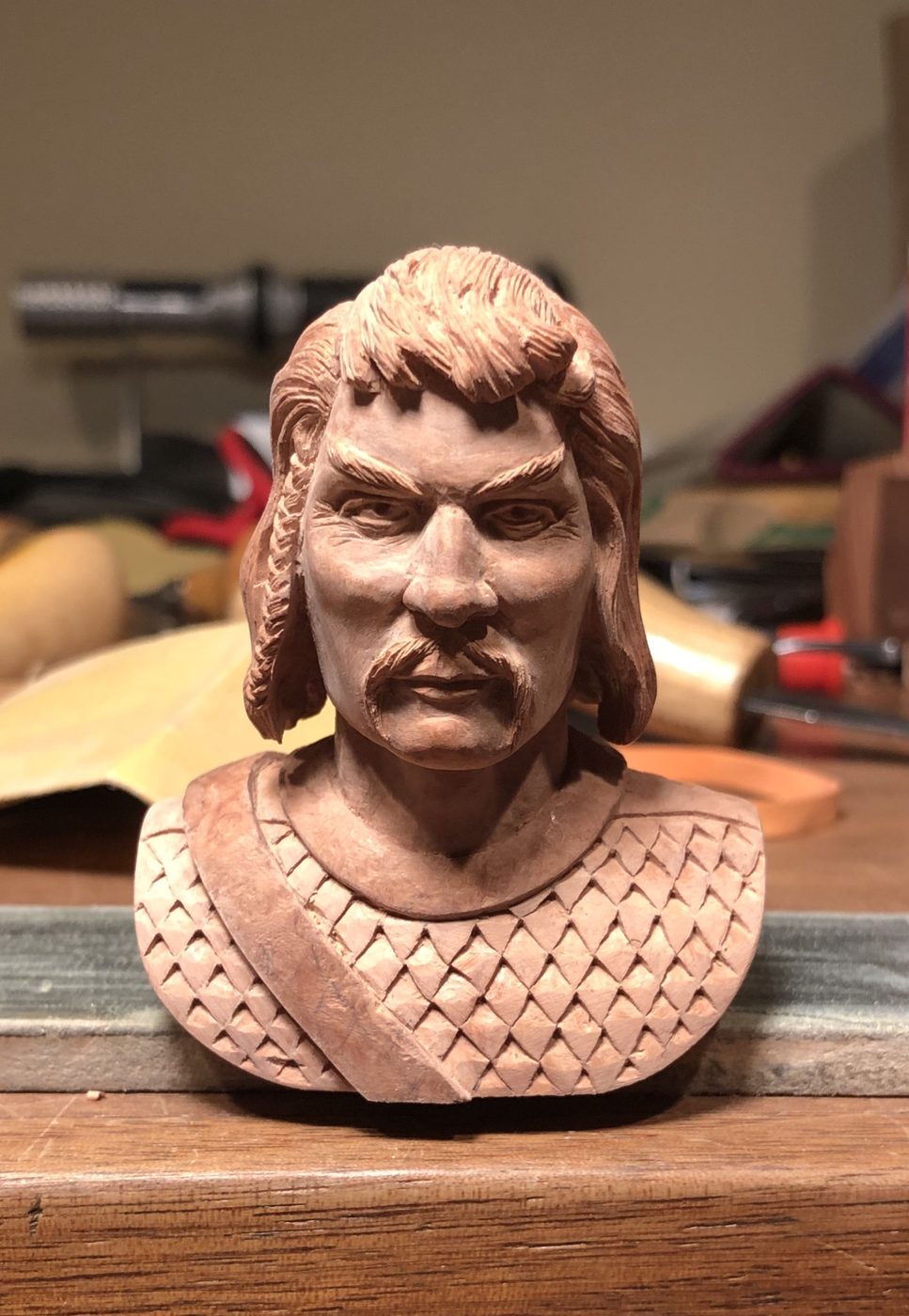 Hand-carved wooden bust by J Drake Customs