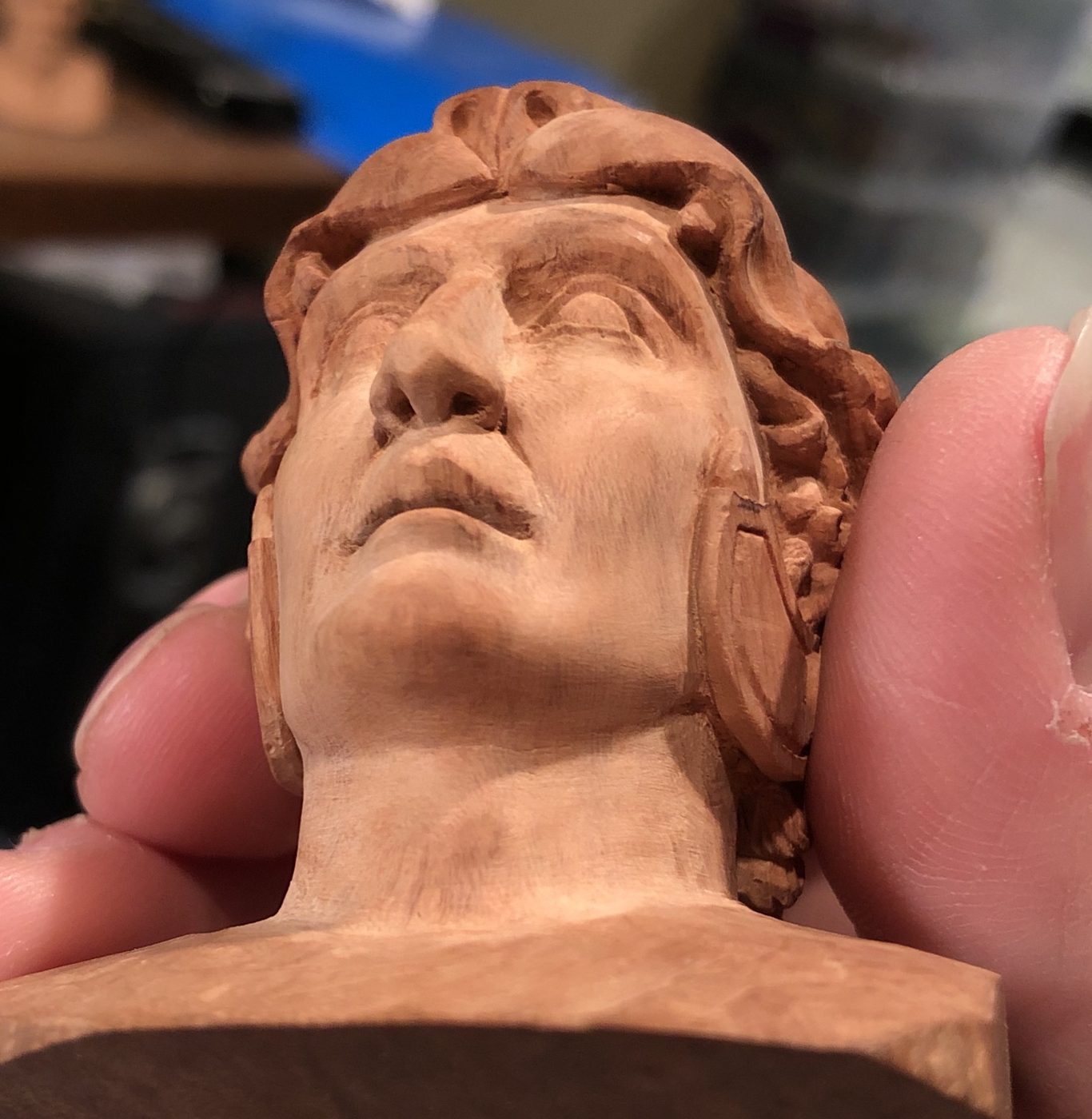 Hand-carved wooden bust by J Drake Customs