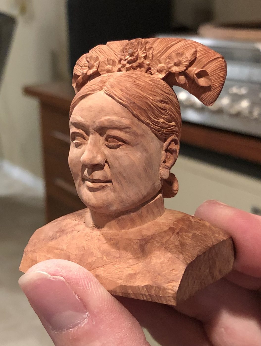 Hand-carved wooden bust by J Drake Customs