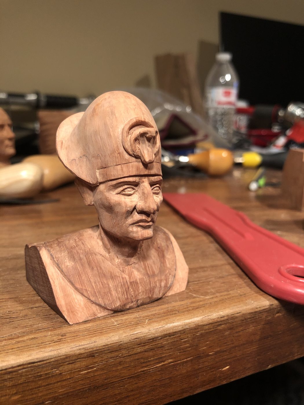 Hand-carved wooden bust by J Drake Customs