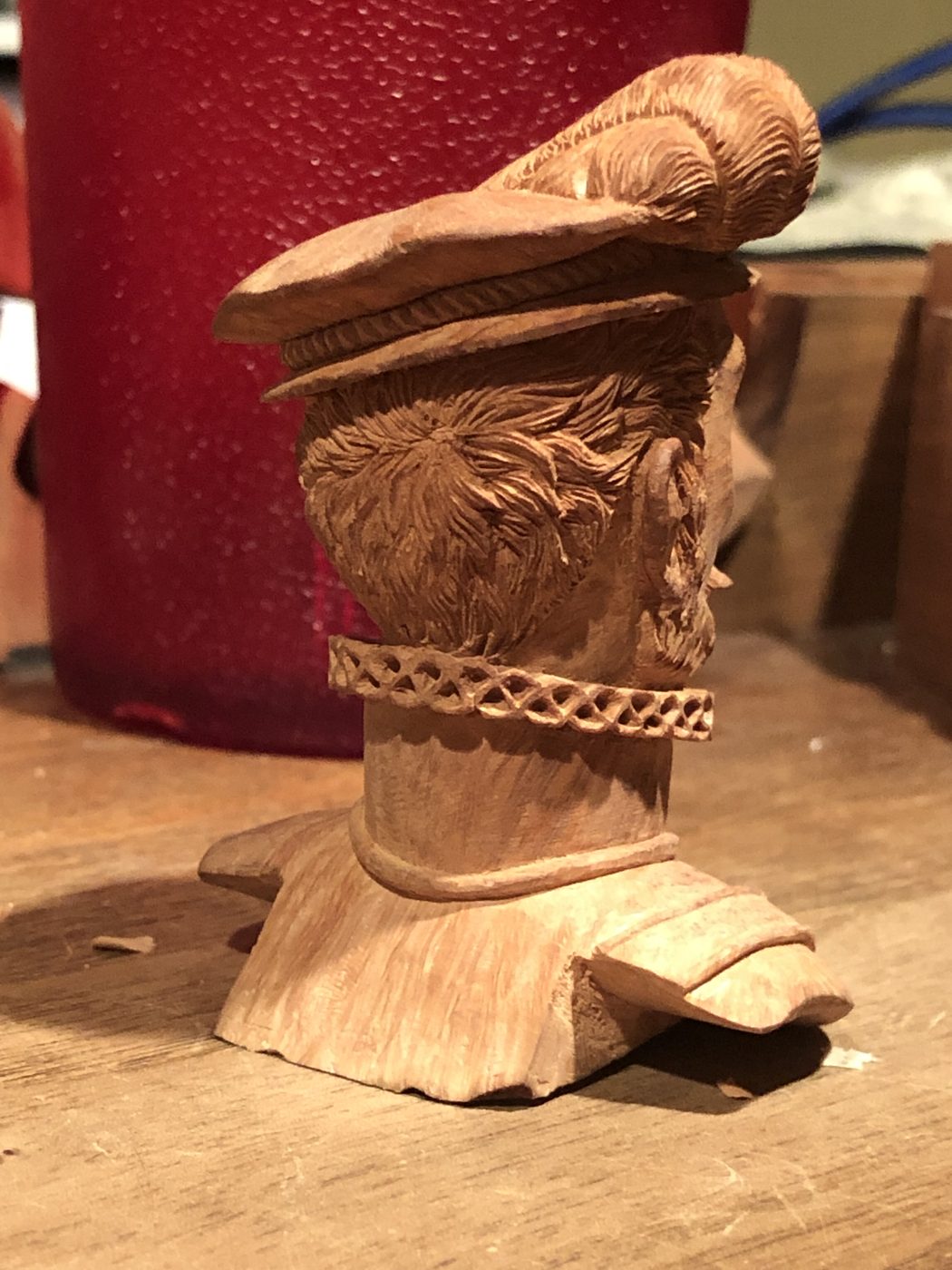 Hand-carved wooden bust by J Drake Customs