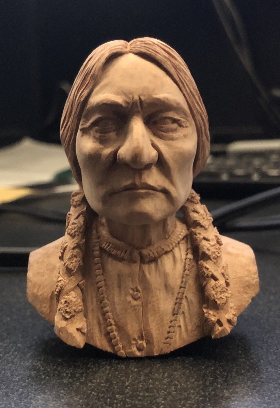 Hand-carved wooden bust by J Drake Customs