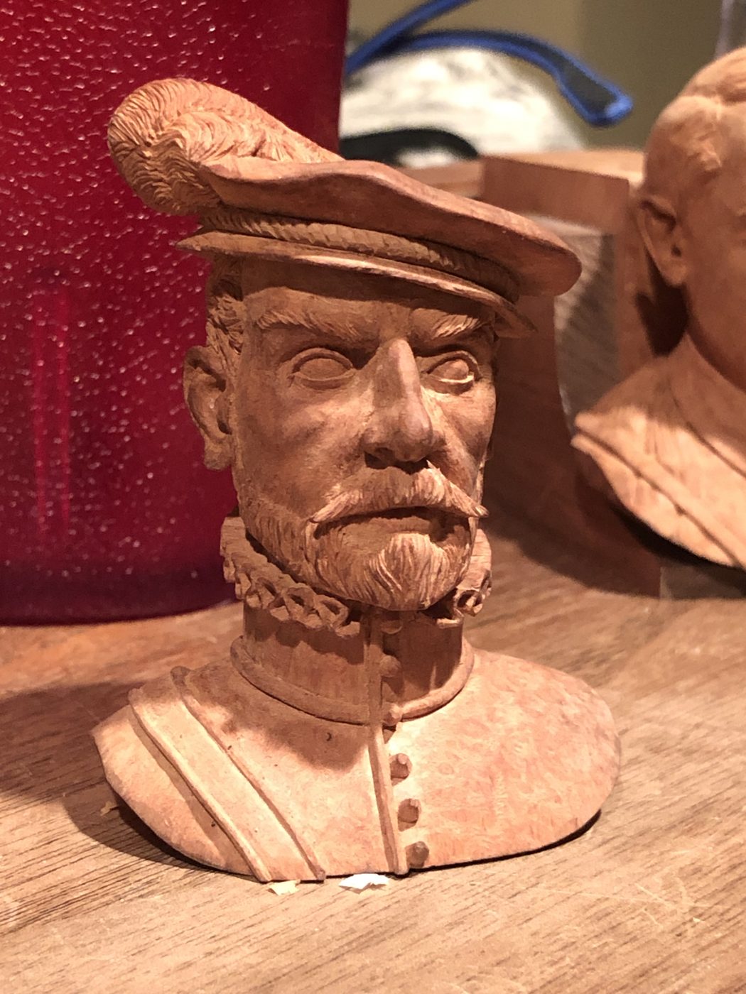 Hand-carved wooden bust by J Drake Customs