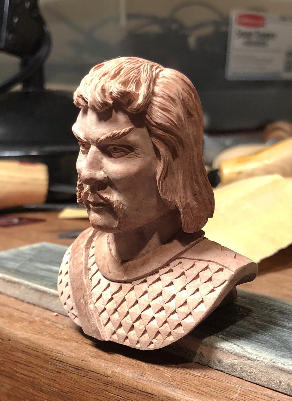 Hand-carved wooden bust by J Drake Customs