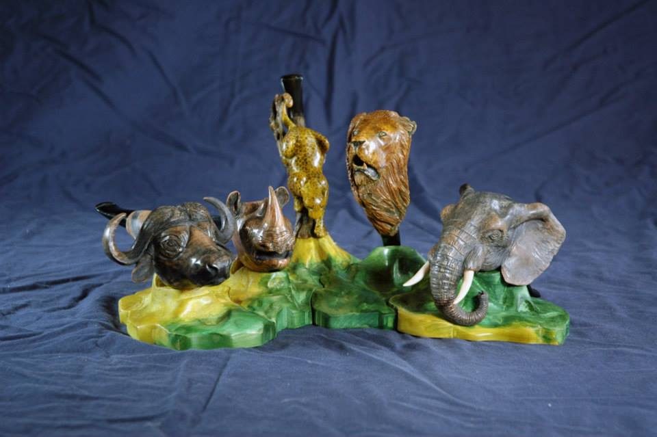 Hand-carved wooden animal sculpture by J Drake Customs