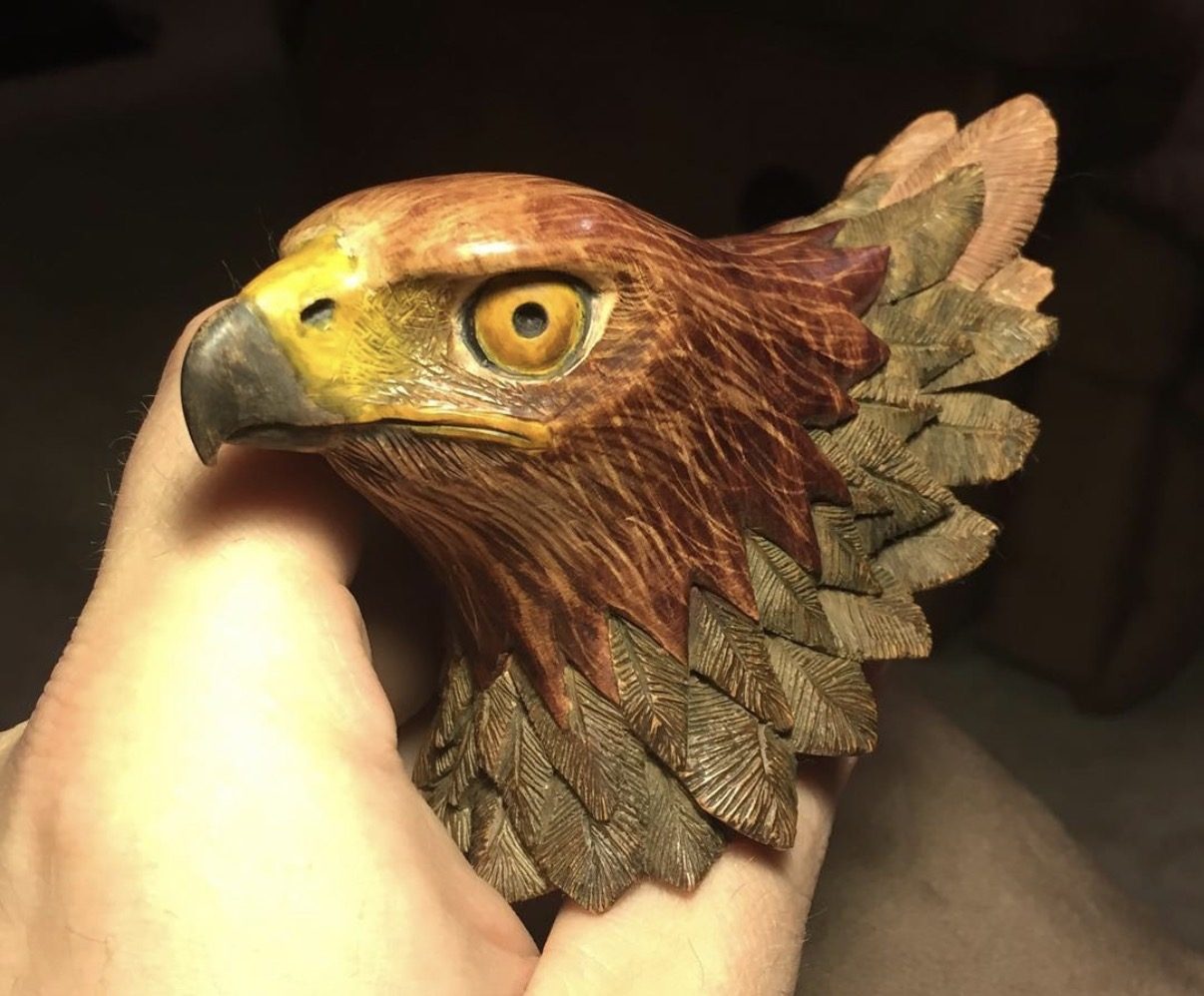 Hand-carved wooden animal sculpture by J Drake Customs