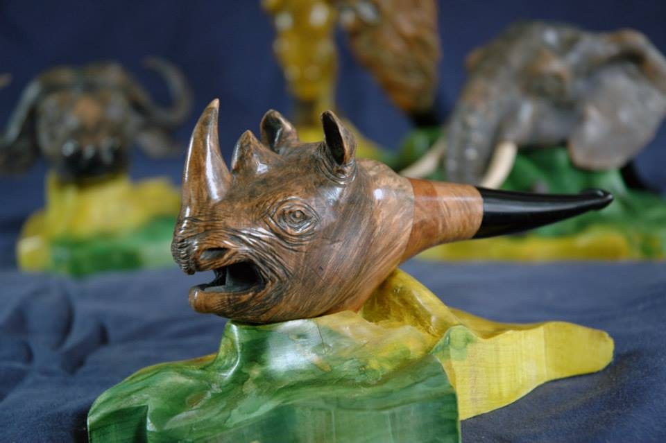 Hand-carved wooden animal sculpture by J Drake Customs