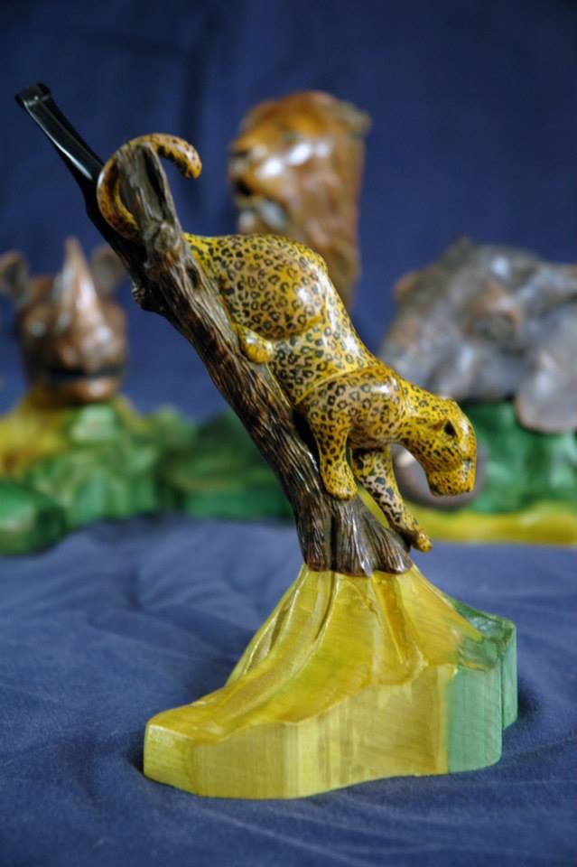 Hand-carved wooden animal sculpture by J Drake Customs