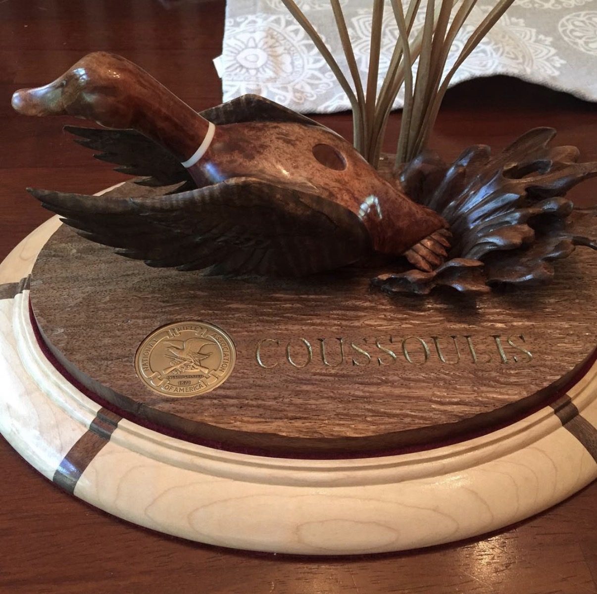 Hand-carved wooden animal sculpture by J Drake Customs
