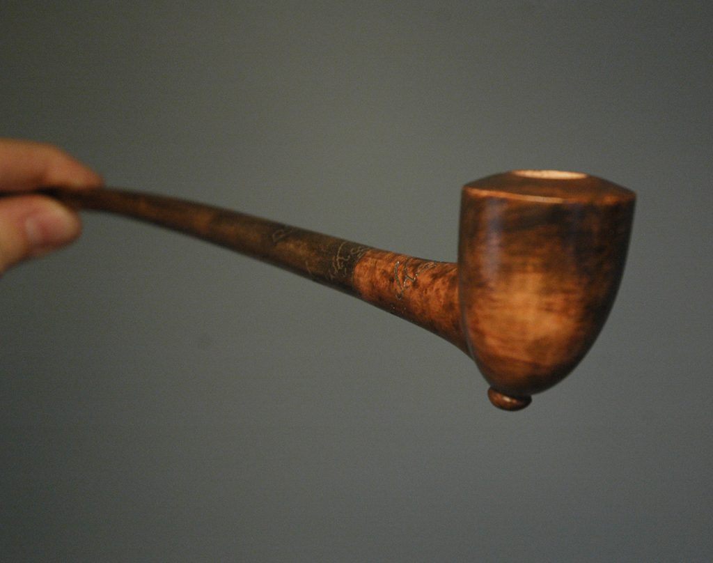 Hand-carved wooden pipe by J Drake Customs